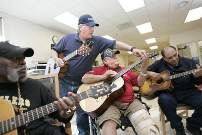 Jefferson Center Collects Donated Guitar’s for Local Veterans