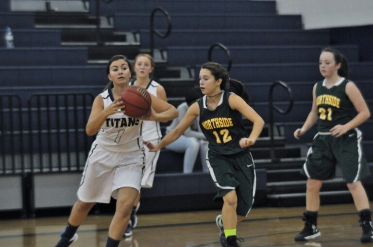 Lady Titans Stop Out-Manned Vikings 55-46