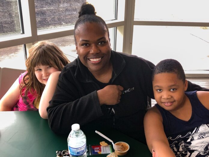 Miss Q with two of her charges.